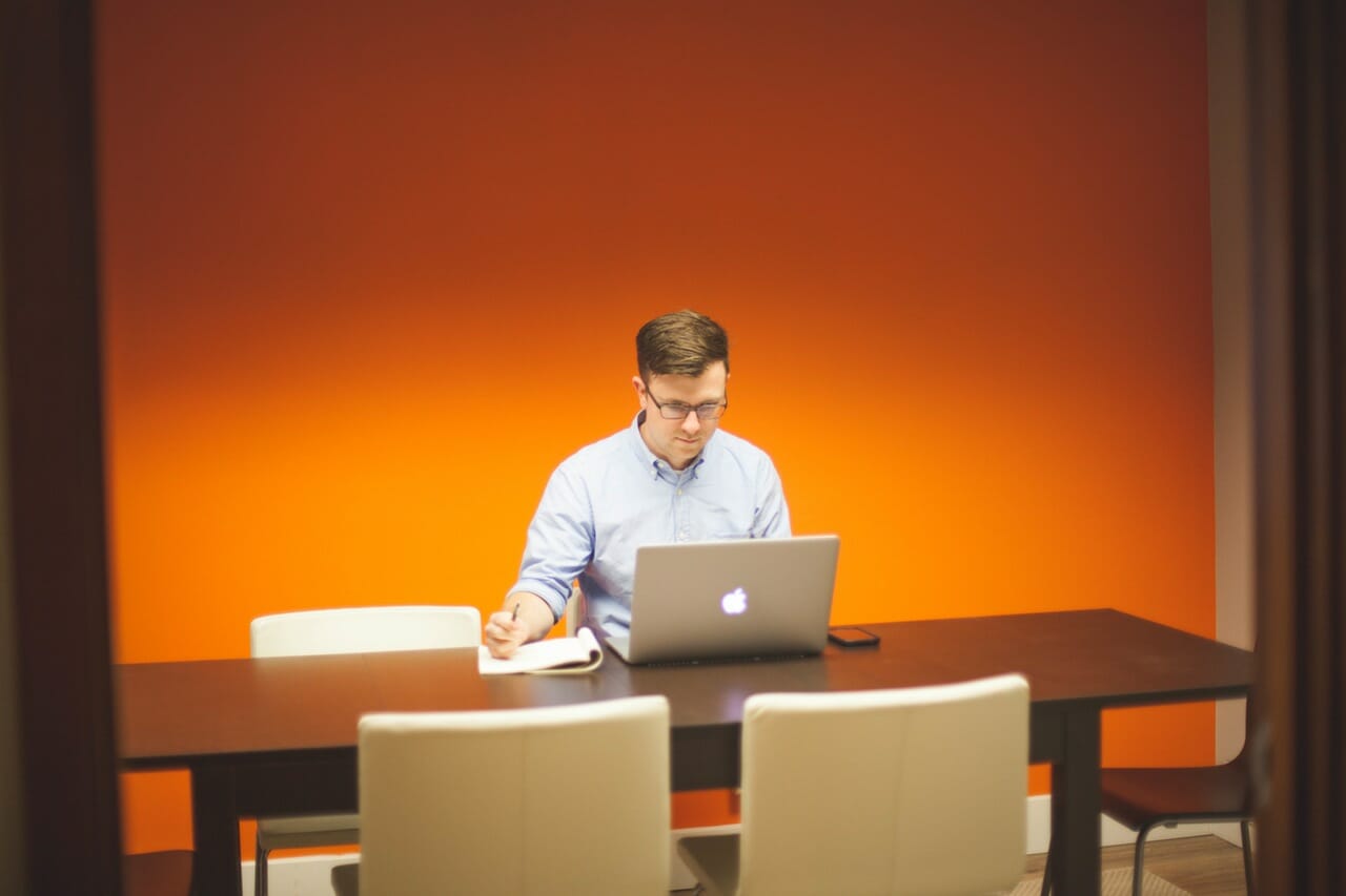 man-writing-business-proposal